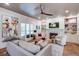Inviting living room with a fireplace, built-in shelves, and modern decor at 1081 Groves Manor Ct, Mount Pleasant, SC 29464