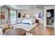 Spacious bedroom with a bed, neutral decor, and artwork, filled with natural light at 1081 Groves Manor Ct, Mount Pleasant, SC 29464
