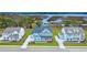 Stunning aerial view of the light blue two-story home with a water view at 1095 Saltwater Cir, Johns Island, SC 29455
