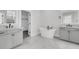 Stylish bathroom with freestanding tub, double vanities, and modern fixtures at 1095 Saltwater Cir, Johns Island, SC 29455