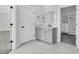 Well-lit bathroom with single vanity and closet at 1095 Saltwater Cir, Johns Island, SC 29455