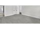 Bedroom featuring carpet, neutral paint, and a view into the bathroom at 1095 Saltwater Cir, Johns Island, SC 29455