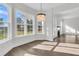 Sunlit breakfast nook with large windows and hardwood flooring, perfect for morning coffee at 1095 Saltwater Cir, Johns Island, SC 29455
