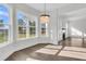 Charming breakfast nook with hardwood floors, large windows, and pendant lighting near living area at 1095 Saltwater Cir, Johns Island, SC 29455