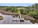 Scenic aerial view of a private dock extending into the waterway and nature in a beautiful community at 1095 Saltwater Cir, Johns Island, SC 29455