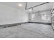 Spacious three car garage with epoxy flooring and natural light at 1095 Saltwater Cir, Johns Island, SC 29455