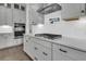 Close-up of a modern kitchen with stainless steel appliances and a gas cooktop at 1095 Saltwater Cir, Johns Island, SC 29455