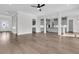 Expansive open living area featuring hardwood floors and seamless transition to the kitchen at 1095 Saltwater Cir, Johns Island, SC 29455