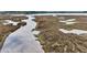 Scenic aerial view capturing the tranquility of the water with abundant vegetation and wildlife at 1095 Saltwater Cir, Johns Island, SC 29455