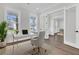 Bright home office with a large window, modern desk, and elegant decor at 1095 Saltwater Cir, Johns Island, SC 29455
