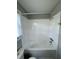 Clean bathroom featuring a white tiled tub, with coordinated fixtures at 1102 Hampton Ct, Summerville, SC 29486