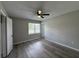 Comfortable bedroom featuring plank flooring, ceiling fan and neutral colors, perfect for relaxation at 1102 Hampton Ct, Summerville, SC 29486
