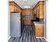 Kitchen featuring wooden cabinets, a stainless steel fridge and modern floors at 1102 Hampton Ct, Summerville, SC 29486