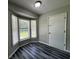 Cozy room featuring a bay window and modern wood flooring at 1102 Hampton Ct, Summerville, SC 29486