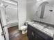 Bathroom featuring a granite countertop vanity, tile floors and a shower-tub combo at 1128 Peninsula Cove Dr, Charleston, SC 29492
