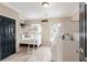 Charming bedroom with white bunk beds, nautical decor, and a dark-colored door at 116 W 2Nd St, Folly Beach, SC 29439