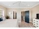 Cozy bedroom with neutral tones, featuring views, an open door and stylish decor creating a peaceful retreat at 116 W 2Nd St, Folly Beach, SC 29439