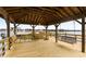 Relaxing dock with ample seating and a swing, offering serene waterfront views and access to nearby waterways at 116 W 2Nd St, Folly Beach, SC 29439