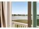 Framed view of the waterway, showcasing waterfront buildings and a serene aquatic landscape at 116 W 2Nd St, Folly Beach, SC 29439
