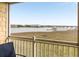 Breathtaking water views from the patio, overlooking the serene harbor and cityscape beyond at 116 W 2Nd St, Folly Beach, SC 29439