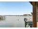 Dockside view reveals a boat on a lift, offering a glimpse into the aquatic lifestyle and waterway access at 116 W 2Nd St, Folly Beach, SC 29439