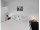 Inviting bedroom with a plush bed, decorative lamps, and a minimalist aesthetic at 1173 Wading Point Blvd, Huger, SC 29450