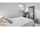 Cozy bedroom featuring a comfortable bed, stylish mirror, and serene ambiance at 1173 Wading Point Blvd, Huger, SC 29450