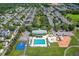 Aerial view of community pool, clubhouse, basketball court, and playground in residential neighborhood at 122 Foxglove Ave, Summerville, SC 29483
