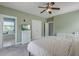 Cozy bedroom featuring carpet flooring, a ceiling fan, and ample closet space at 122 Foxglove Ave, Summerville, SC 29483