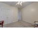 Neutral bedroom featuring a closet, neutral carpet, ceiling fan, and white paint at 122 Foxglove Ave, Summerville, SC 29483