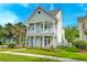 Charming two-story home with a spacious porch and landscaped front yard at 122 Foxglove Ave, Summerville, SC 29483