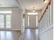 Bright foyer with hardwood floors, a staircase, and a front door with sidelights at 122 Foxglove Ave, Summerville, SC 29483