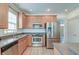 Updated kitchen features stainless steel appliances, ample cabinet space, and modern finishes at 122 Foxglove Ave, Summerville, SC 29483