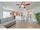 Open concept living room and kitchen with modern finishes and lots of natural light at 122 Foxglove Ave, Summerville, SC 29483