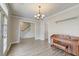 Open living space with wood floors, bright trim and a piano at 122 Foxglove Ave, Summerville, SC 29483