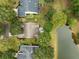Aerial view of home and backyard with pond at 1232 Palmetto Peninsula Dr, Mount Pleasant, SC 29464