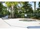 Relaxing hot tub area with lounge chairs and lush green trees offering a peaceful retreat at 1232 Palmetto Peninsula Dr, Mount Pleasant, SC 29464
