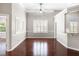 Spacious dining room features wood floors, lots of natural light, and neutral wall color at 1232 Palmetto Peninsula Dr, Mount Pleasant, SC 29464