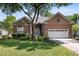 Charming brick home with a well-manicured front yard and mature trees at 1232 Palmetto Peninsula Dr, Mount Pleasant, SC 29464