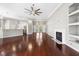 Spacious living room featuring hardwood floors, fireplace, and an open floor plan at 1232 Palmetto Peninsula Dr, Mount Pleasant, SC 29464