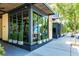 Street-level restaurant exterior featuring ample natural light from its expansive windows at 1232 Palmetto Peninsula Dr, Mount Pleasant, SC 29464