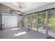 Cozy sunroom with large windows and tile flooring, perfect for relaxation at 1232 Palmetto Peninsula Dr, Mount Pleasant, SC 29464