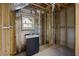 Partially finished basement bathroom with sink and view of plumbing and framing at 1327 Wood Sorrel Dr, Moncks Corner, SC 29461