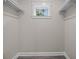 Walk-in closet with shelving and a window providing natural light at 1327 Wood Sorrel Dr, Moncks Corner, SC 29461
