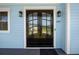 Charming home featuring a stylish black double front door with glass panels and sidelights at 1327 Wood Sorrel Dr, Moncks Corner, SC 29461