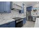 Well-appointed kitchen featuring custom cabinetry, stainless steel appliances, and modern countertops at 1327 Wood Sorrel Dr, Moncks Corner, SC 29461