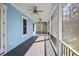 Screened porch with ceiling fans and beautiful outdoor view at 1327 Wood Sorrel Dr, Moncks Corner, SC 29461