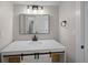 Bathroom vanity with decorative baskets, white countertop, and modern black fixtures at 1327 Wood Sorrel Dr, Moncks Corner, SC 29461
