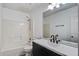 Bathroom showcasing a shower/tub combo, large mirror, single sink, and black fixtures at 137 Ashton Dr, Goose Creek, SC 29445