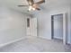 Bedroom features neutral walls, carpet, ceiling fan and closet with bifold door at 137 Ashton Dr, Goose Creek, SC 29445